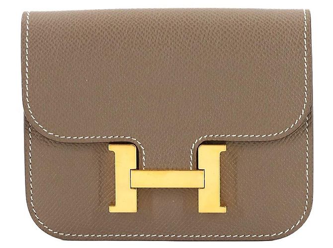 Billetera bifold slim Hermès Constance Gris pardo