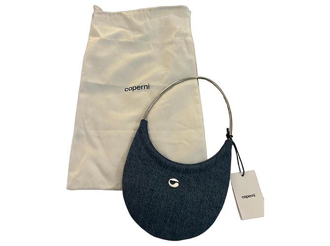 Bolsa de ombro Coperni em jeans azul