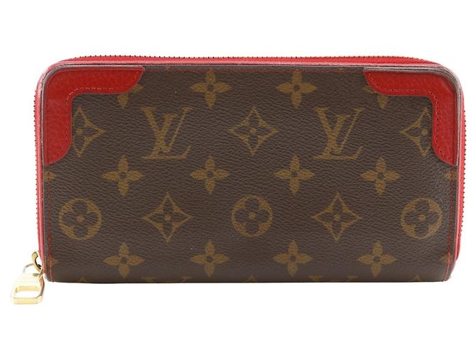 Cartera Zippy Retiro Long Louis Vuitton Castaño Roja Fucsia
