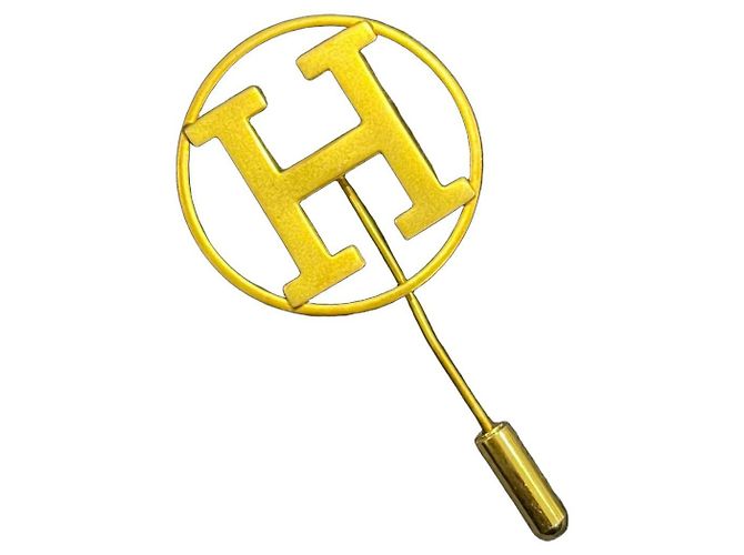 Hermès H runde goldene Brosche