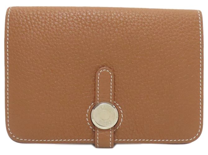 Monedero compacto Dogon de Hermès Dorado