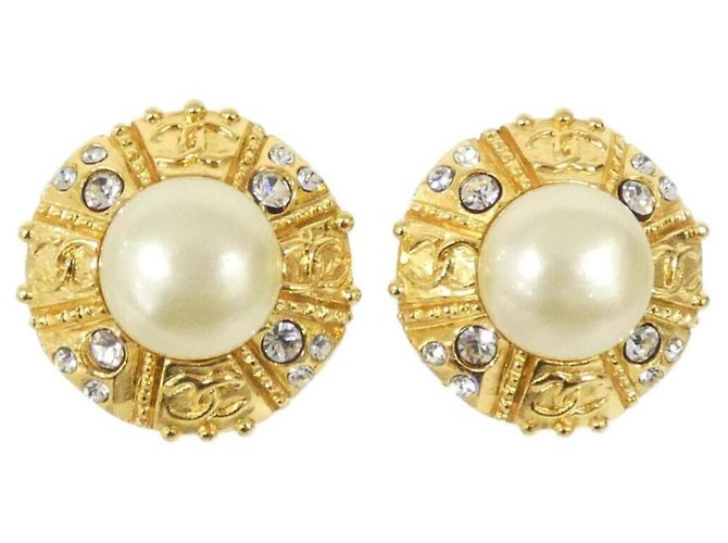 Orecchini a clip dorati e bianchi di Chanel Bianco D'oro