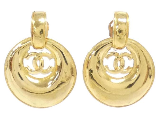 Pendientes de clip dorados Chanel