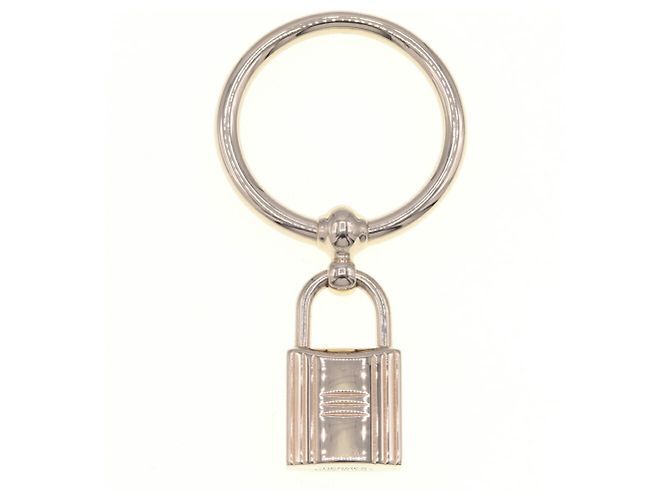 Porte-clés en métal doré Hermès 