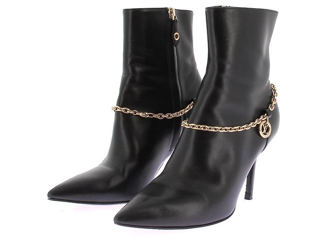 Louis Vuitton Botines de cuero negro con cadena dorada Talla 38