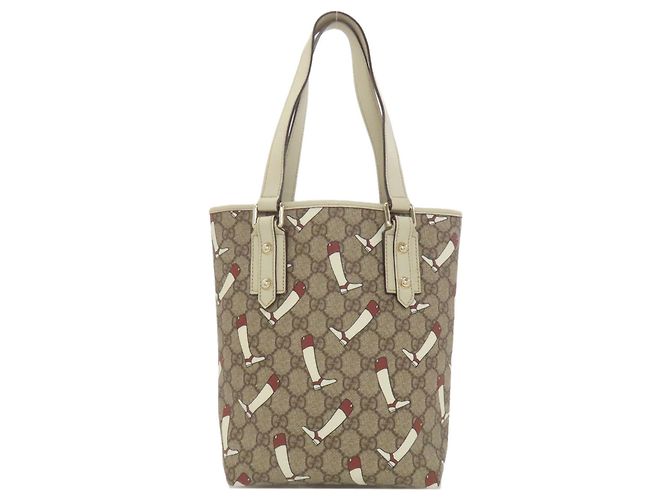 Borsa in PVC marrone e bianco Gucci