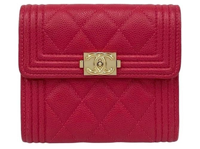 Cartera tri-fold de cuero caviar rosa Chanel Boy
