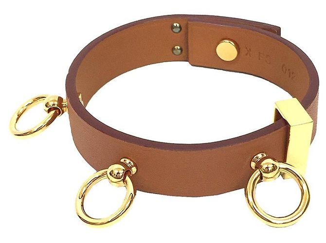 Pulseira de couro Hermès com charm Marrom