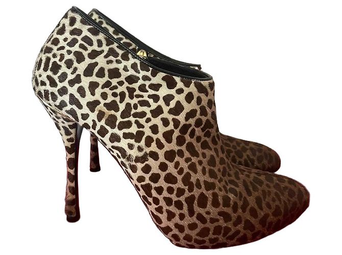 Botines de pelo de ternera con estampado de leopardo Gucci
