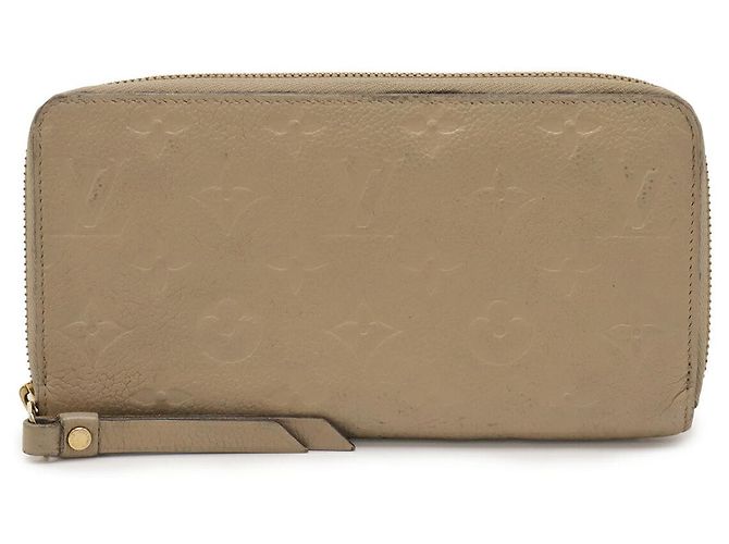 Carteira Zippy Monogram Empreinte Louis Vuitton Marrom Bege
