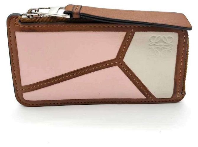 Puzzle Loewe Rosa Leder-Münzgeldbörse Pink