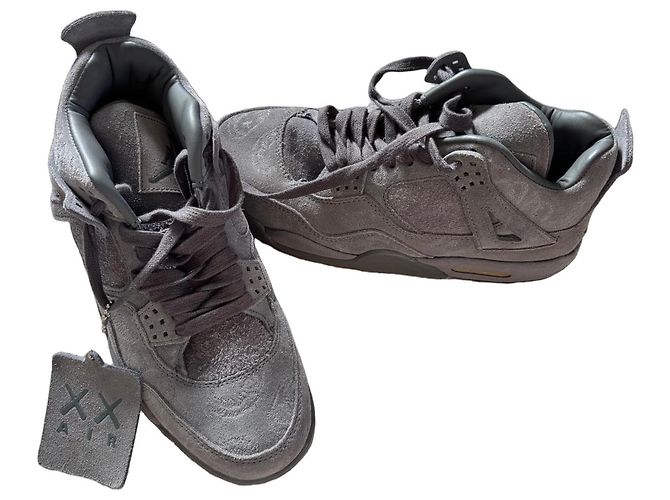 Autre Marque Baskets Air Jordan 4 Retro KAWS Gris
