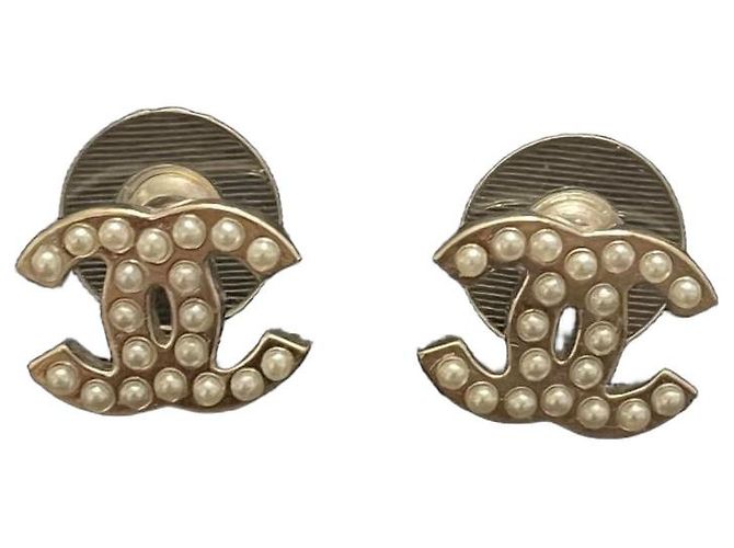 Chanel pendientes de metal plateado CC Plata