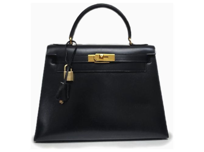 Hermès Kelly 28 en cuir box noir Noisette