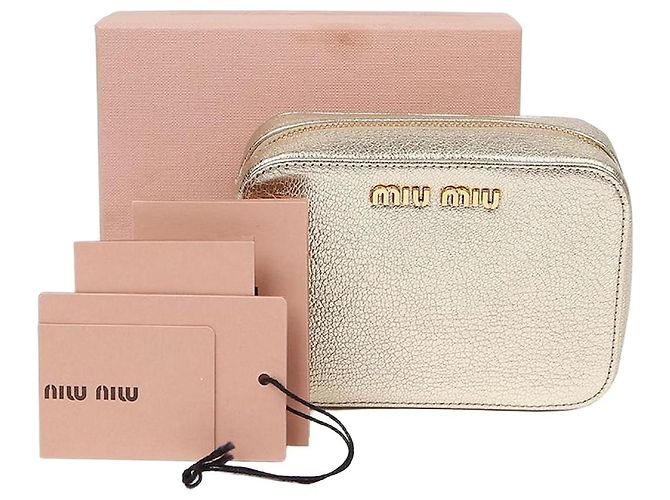 Miu Miu Pochette zippée avec logo Doré