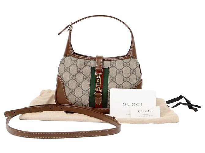 Gucci Mini bolsa hobo Jackie com alça cruzada Marrom