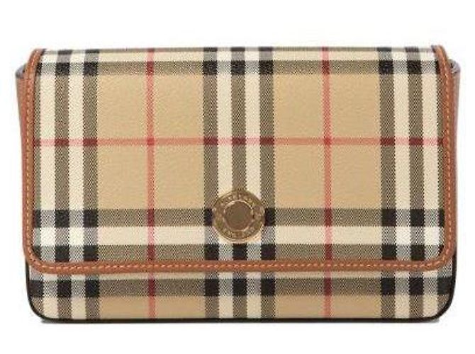 Burberry Bolsa transversal de lona impressa Marrom
