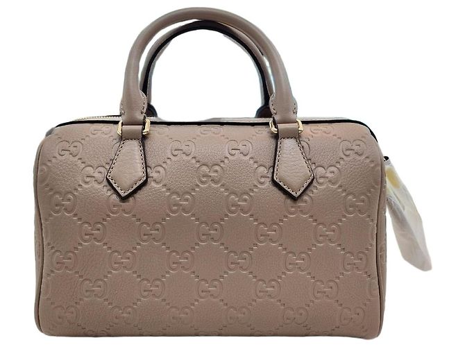 Gucci Bolsa de ombro GG Emblem Small com alça superior Marrom