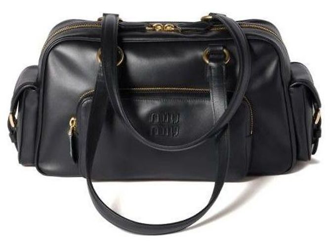 Miu Miu Bolsa de mão com alça superior em couro Napa Preto