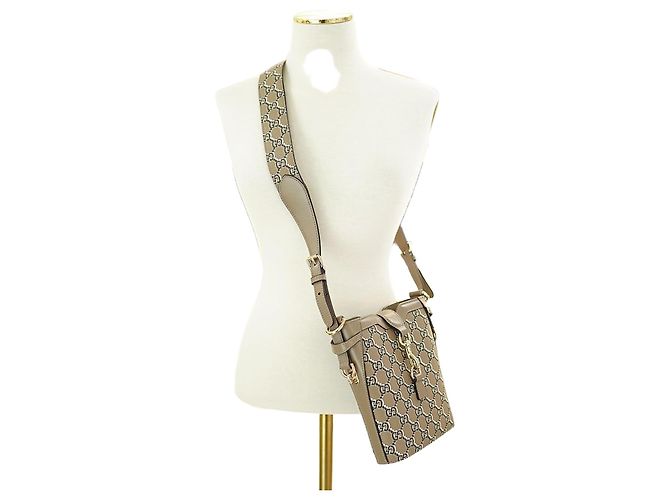 Gucci Borsa a spalla mini secchiello GG Shadow Marrone