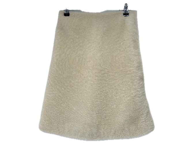 Autre Marque Saia de shearling creme em pele Bege