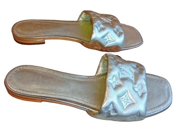 Louis Vuitton Pantoletten Leder Gold Golden