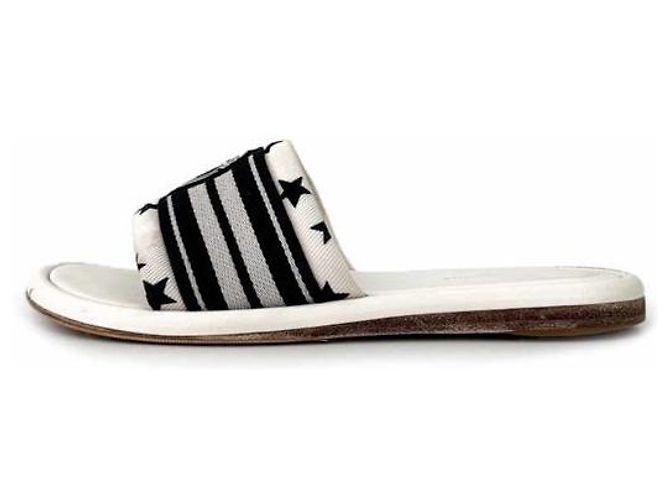 Louis Vuitton Flache Mules mit Magnetverschluss Weiß