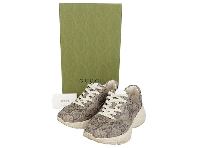 Gucci Tênis de latão Marrom