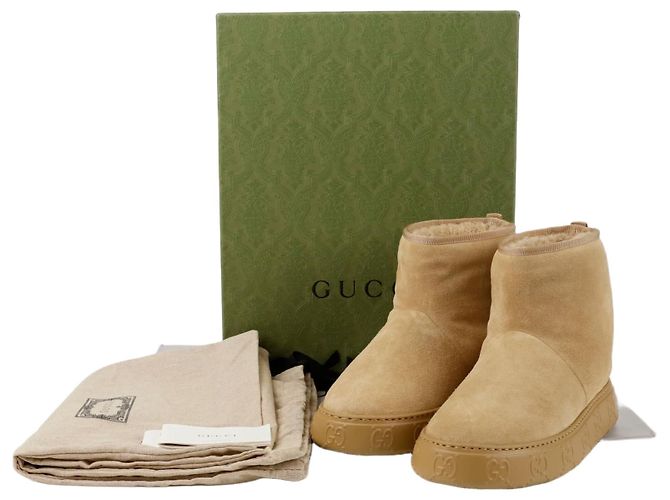 Gucci Botines GG Castaño
