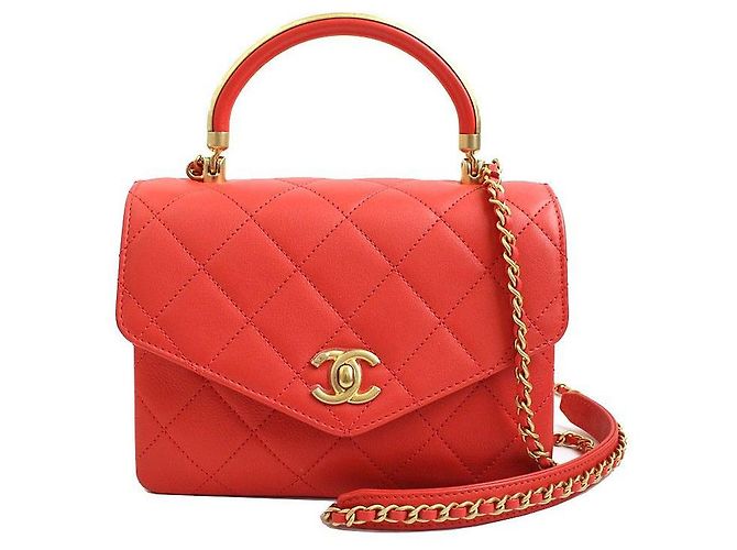 Chanel Serie di borse tote e a tracolla in oro opaco e rosso corallo