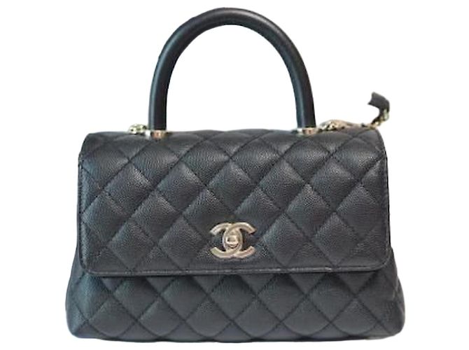 Chanel Sac à main flap en caviar noir petit modèle Coco Handle avec puce interne