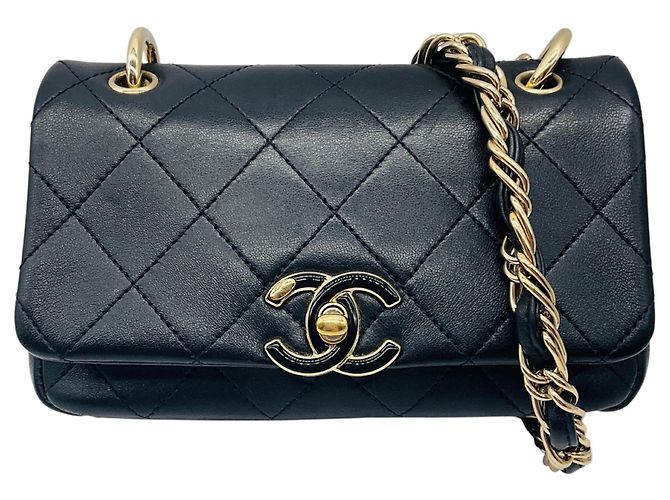 Bolsa de mão em couro matelassé Chanel preto / dourado com logo CC