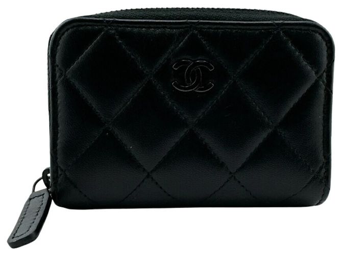 Monedero redondo de cuero negro Chanel