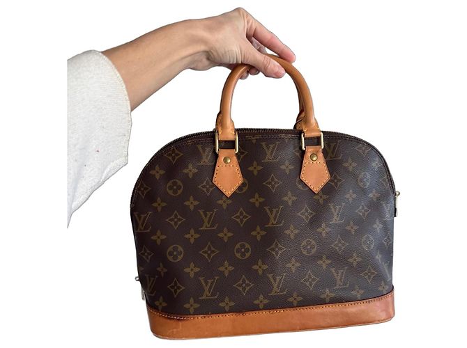 Louis Vuitton Alma Handtasche aus braunem Leder