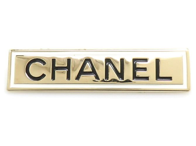Spilla in smalto e metallo Chanel Nero Bianco D'oro