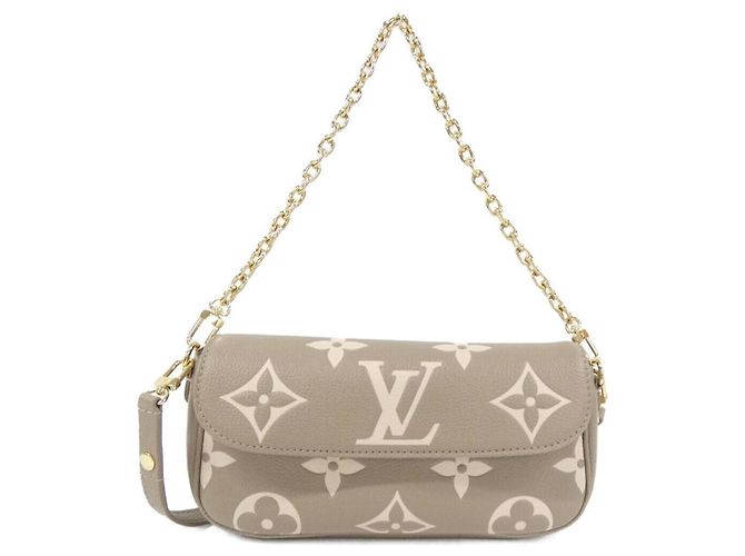 Cartera Louis Vuitton Monogram Empreinte Wallet on Chain Ivy M82211 Gris