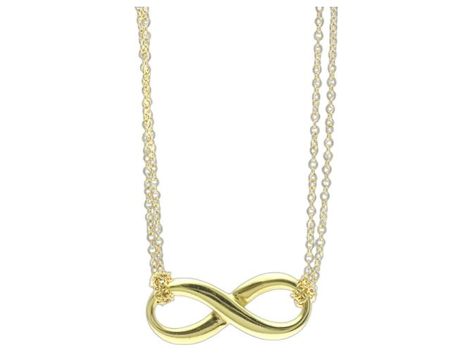 Tiffany & Co Collier Pendentif Infinity en Or Jaune 18K Tiffany Doré
