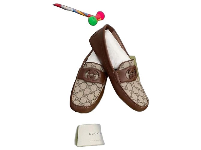 Mocassini Gucci in pelle monogram Marrone