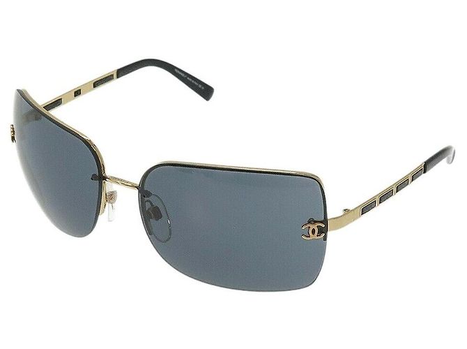 Occhiali da sole navy con logo CC in oro e nero di Chanel 4112 D'oro