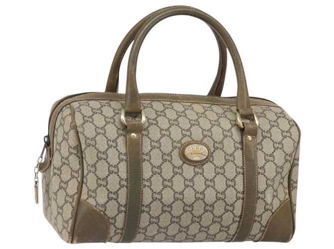 Gucci Bolsa Boston GG Plus Supreme em PVC bege e dourado Auth 166725