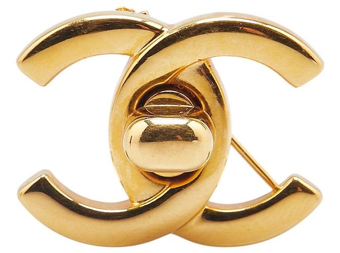 Timeless Spilla Turnlock Coco Mark di Chanel D'oro