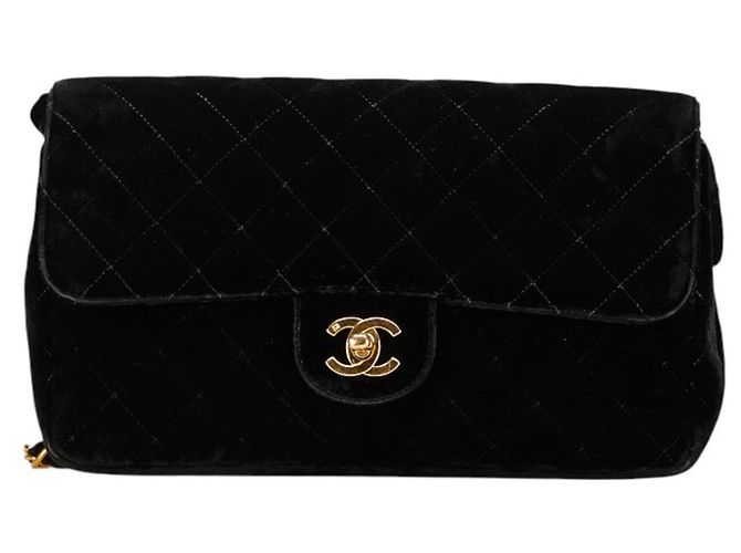 Zaino Chanel Matelassé 25 Coco Mark in velluto nero e pelle