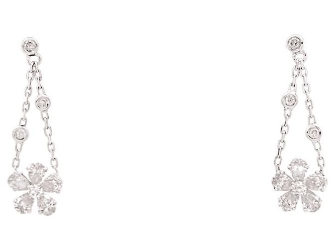Boucles d'oreilles Messika , "Spring" or blanc, diamants.