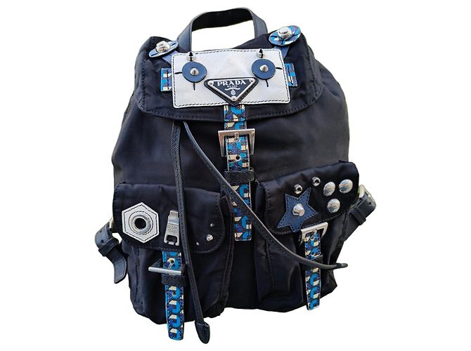 Prada black nylon backpack adorned with blue and white details
