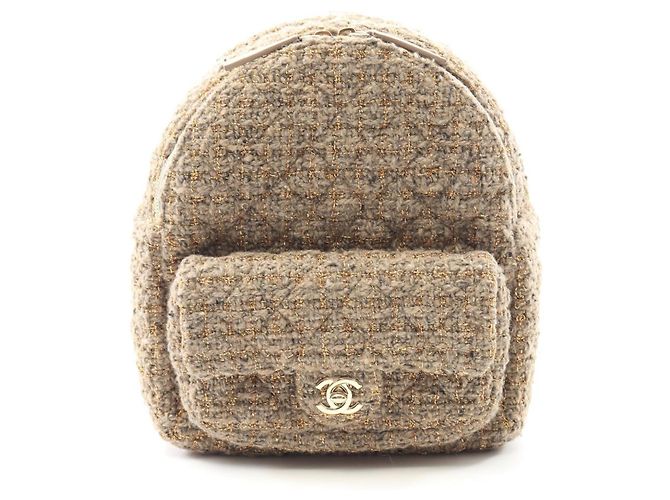 Timeless Chanel Matelassé Fabric Leather Backpack Beige