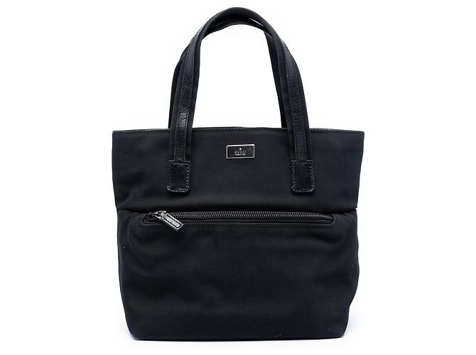 Gucci schwarze GG Canvas-Handtasche
