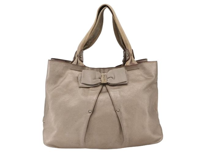 Salvatore Ferragamo Vala Leather D'oro