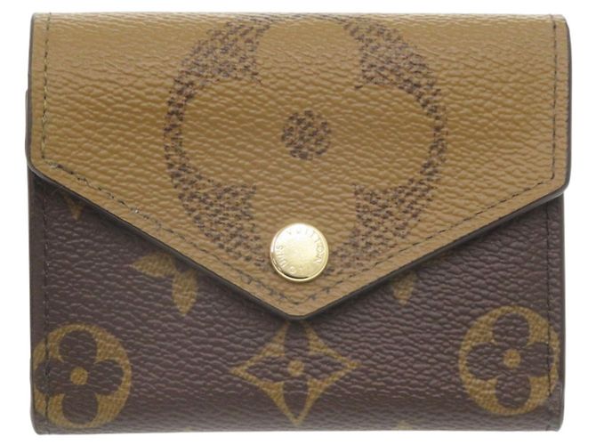Cartera Zoe Tri-Fold Louis Vuitton Castaño Monograma