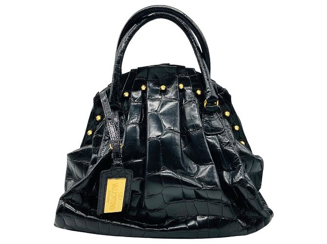 Valentino Garavani Borsa a mano in pelle di coccodrillo nera con borchie e hardware dorato Valentino Nero