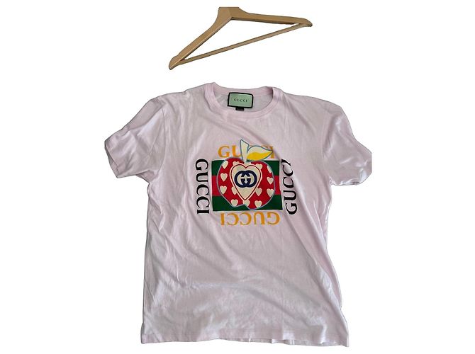 Camiseta Gucci rosa con estampado de logo